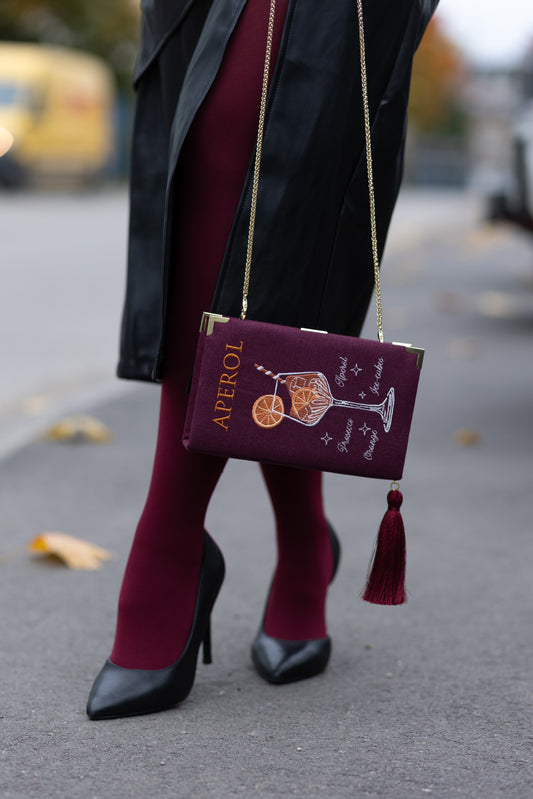The Burgundy Aperol Clutch: A Timeless Elegance in a Trendy Hue