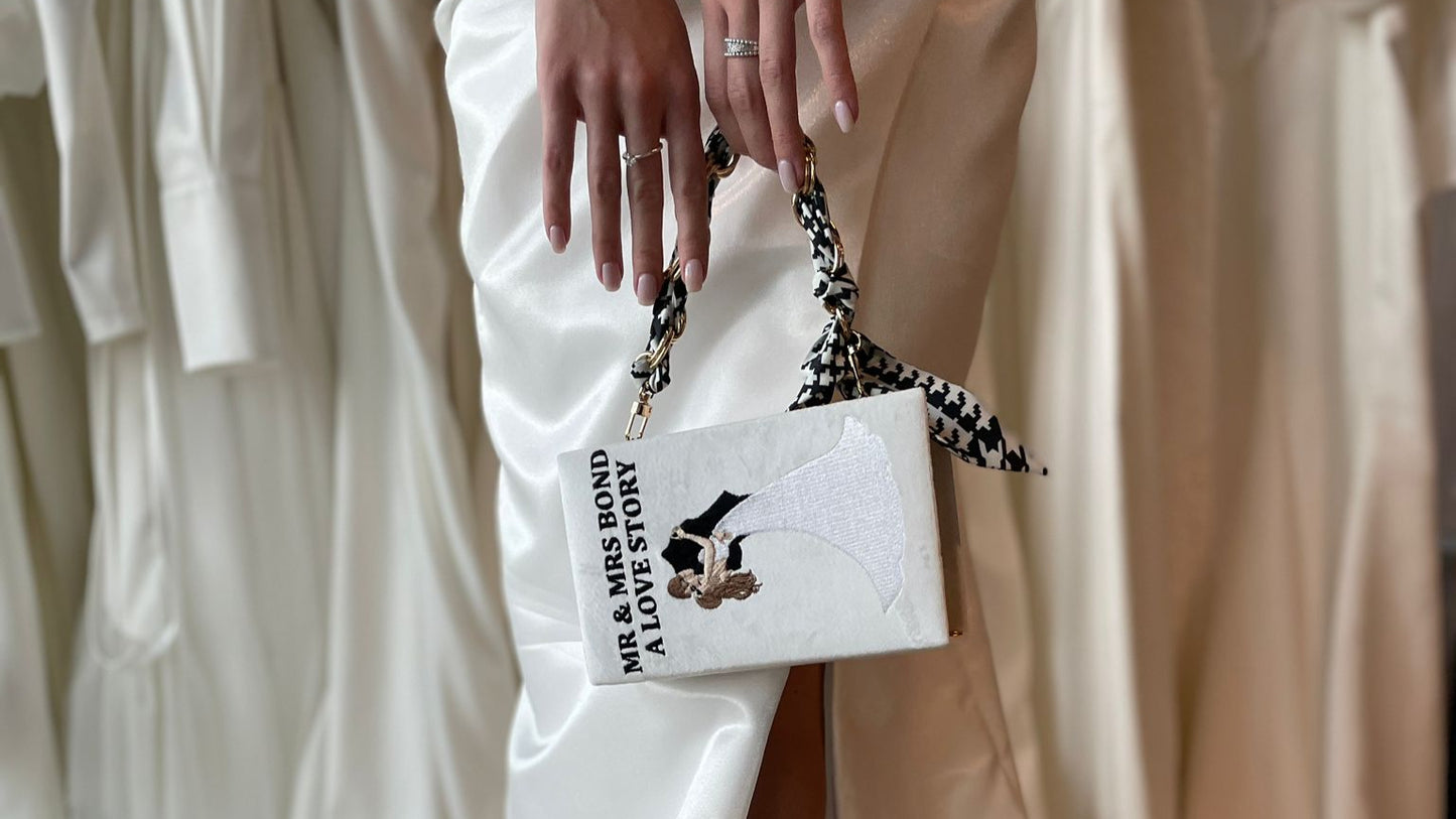 Bridal clutch book with personalized design/crest