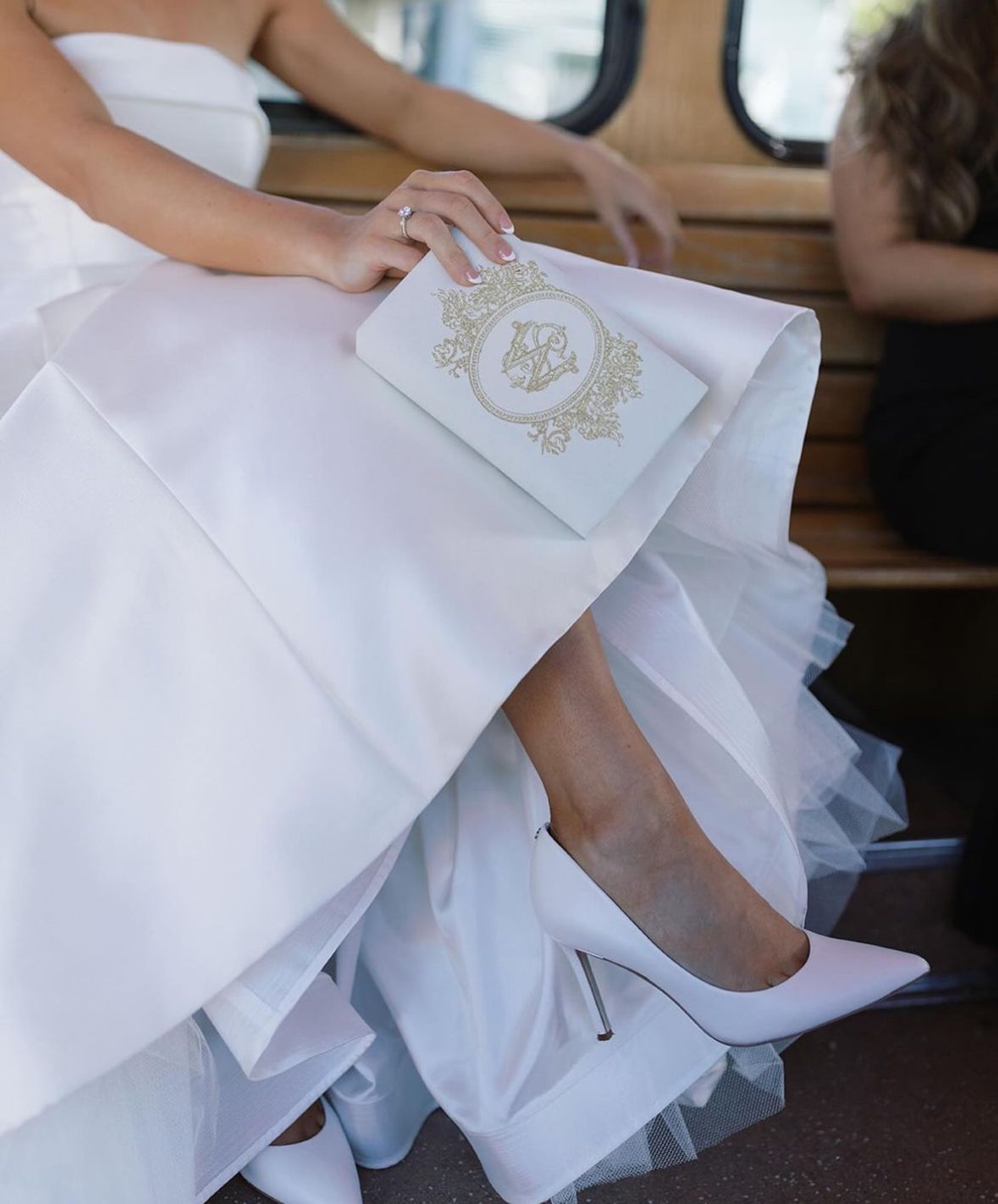 Bridal clutch book with personalized design/crest