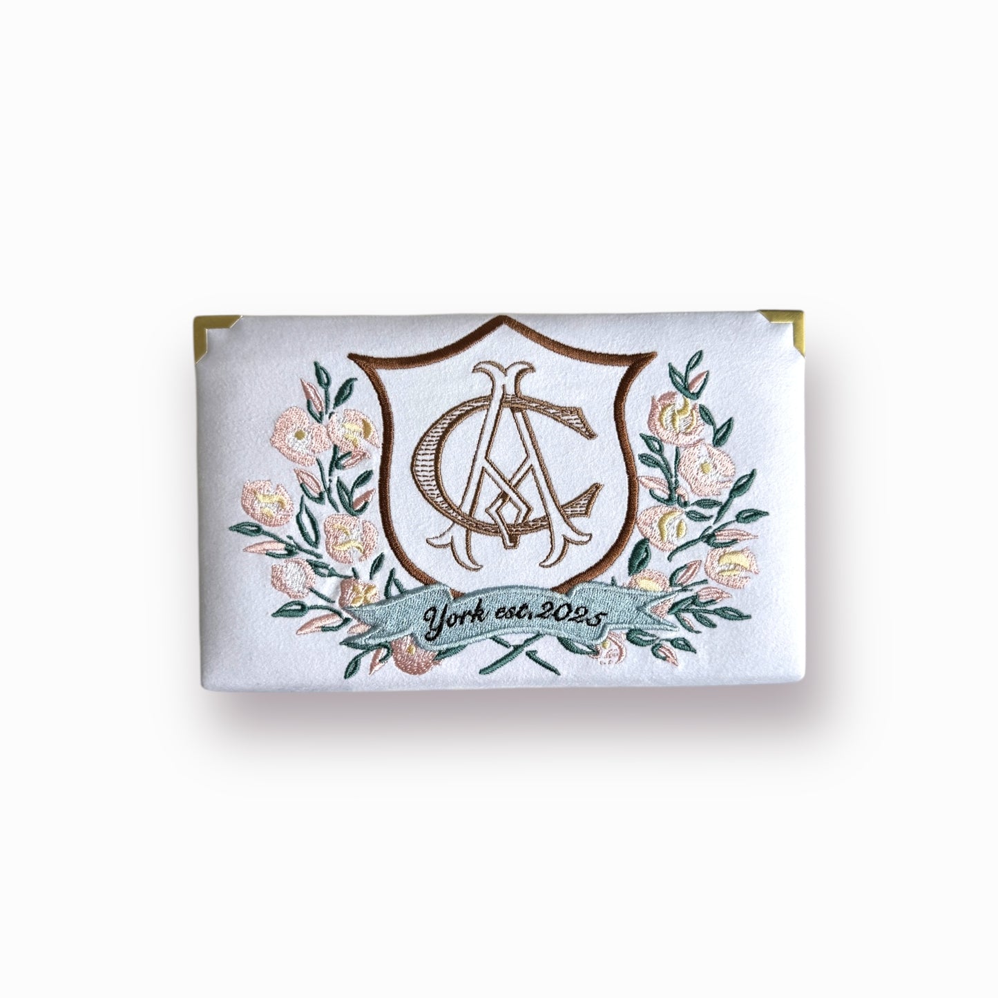 Bridal clutch book with personalized design/crest
