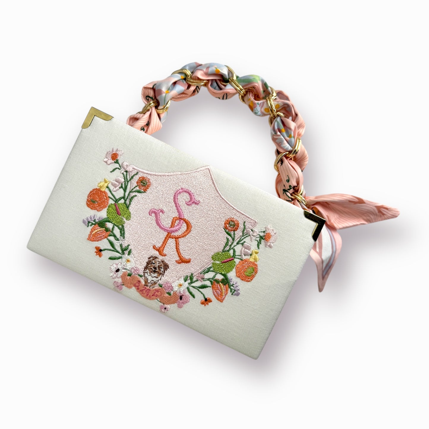 Bridal clutch book with personalized design/crest
