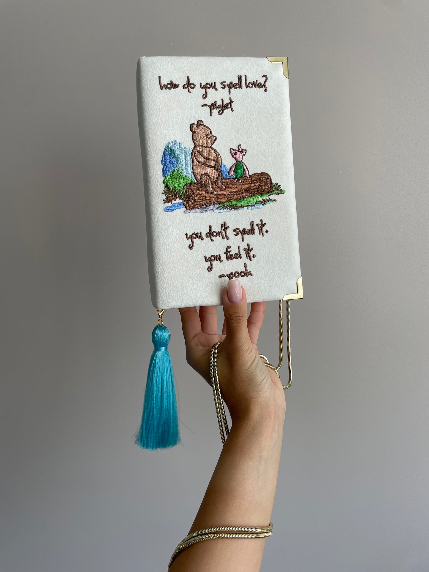 Ivory white clutch book with Winnie the Pooh