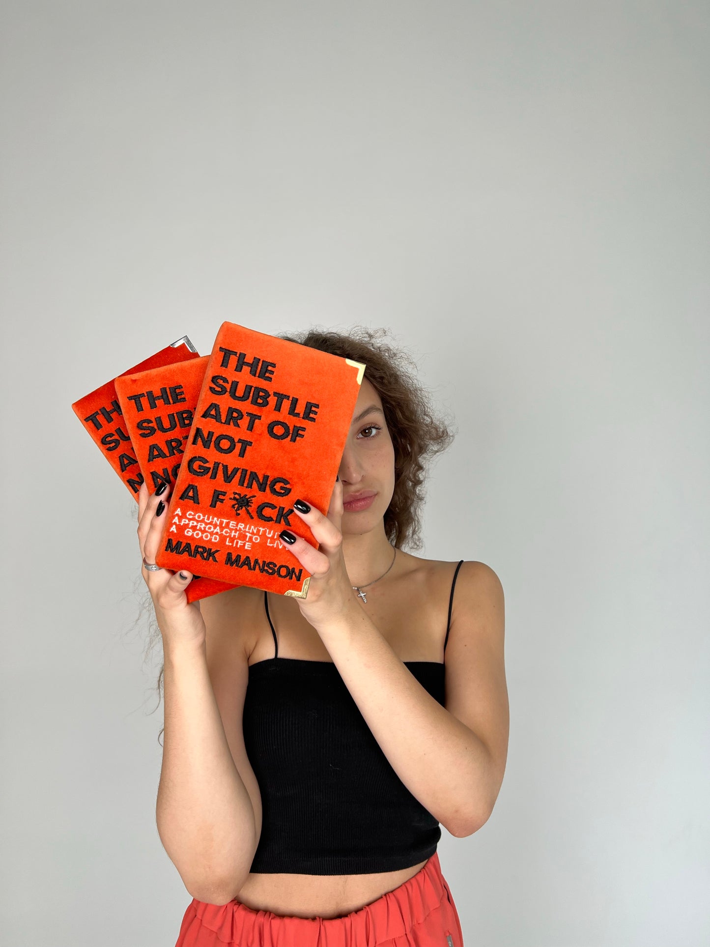 Book clutch purse Mark Manson orange edition
