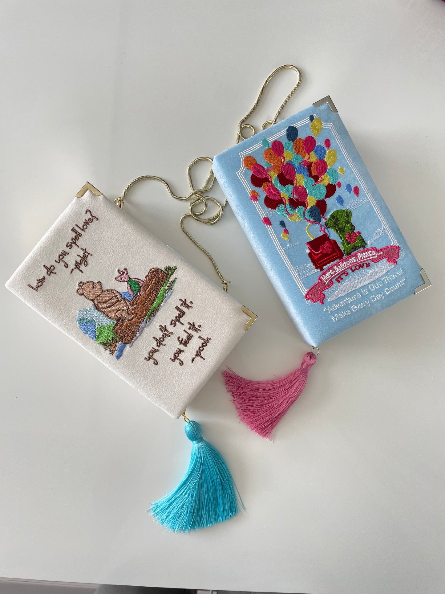 Ivory white clutch book with Winnie the Pooh