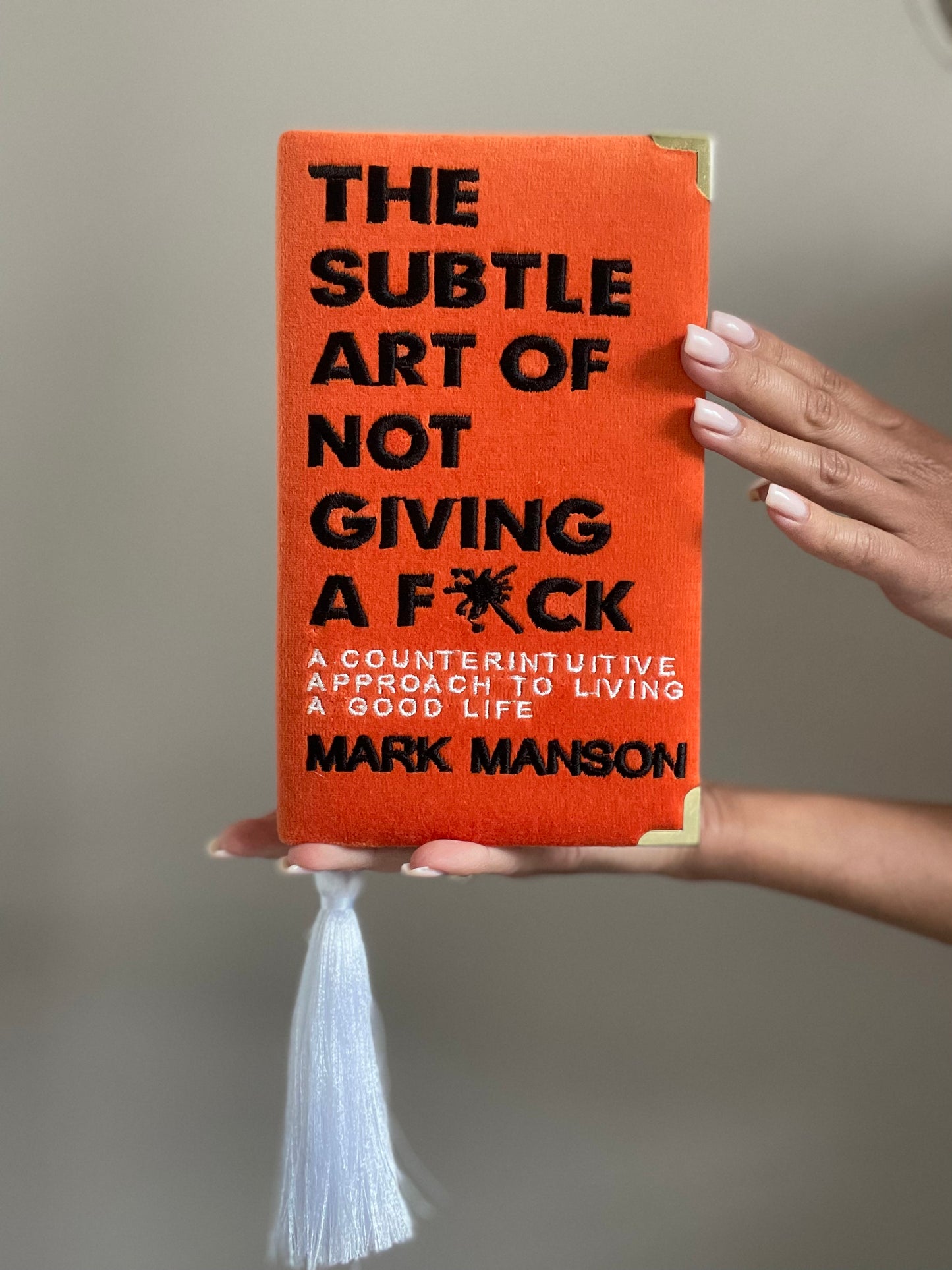 Book clutch purse Mark Manson orange edition